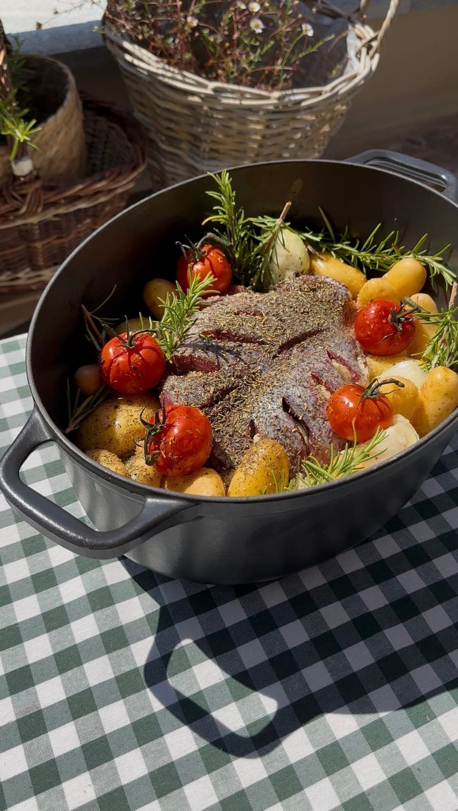 A casserole of meat, potatoes and rosemary