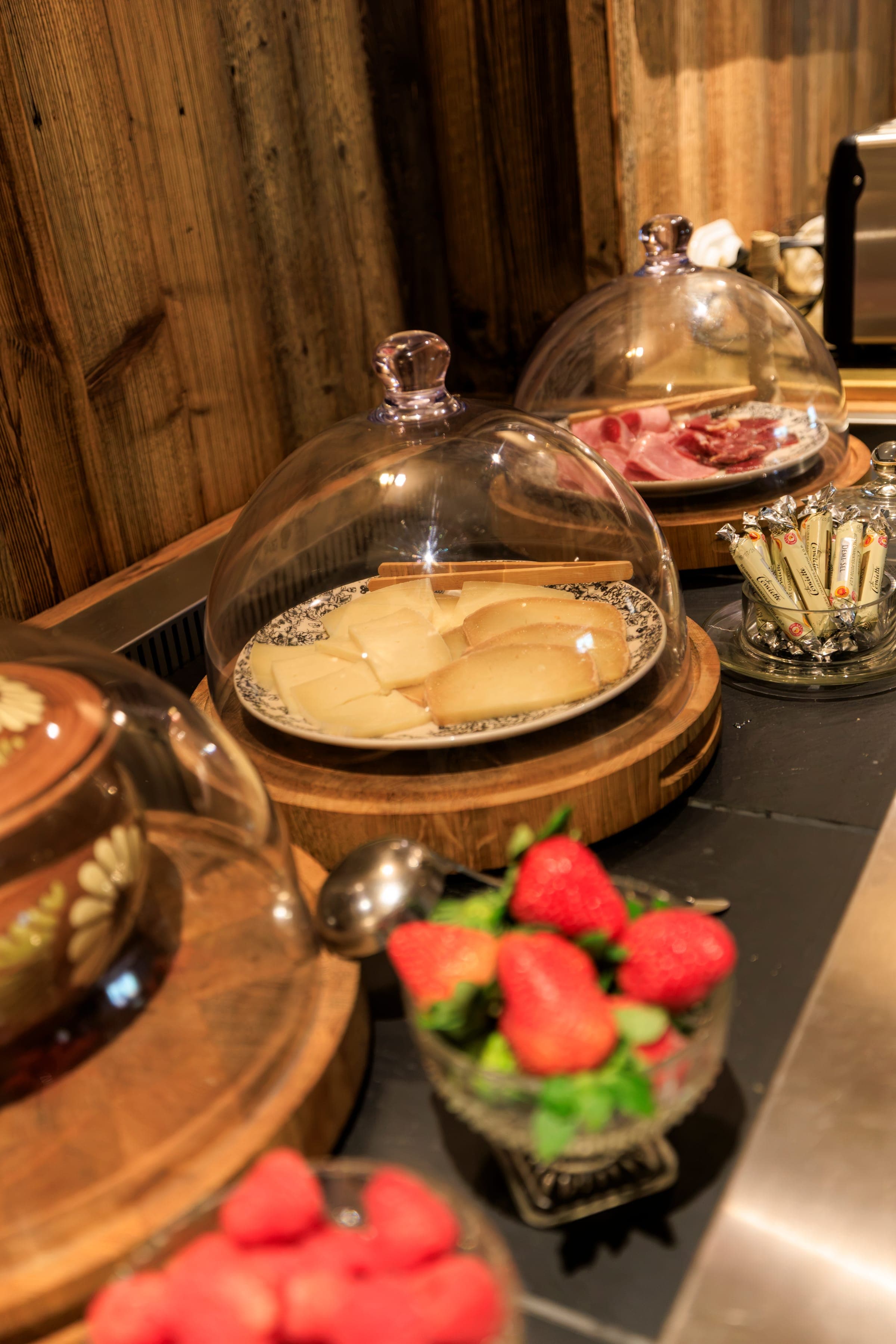 The breakfast buffet, cheeses, charcuterie and strawberries